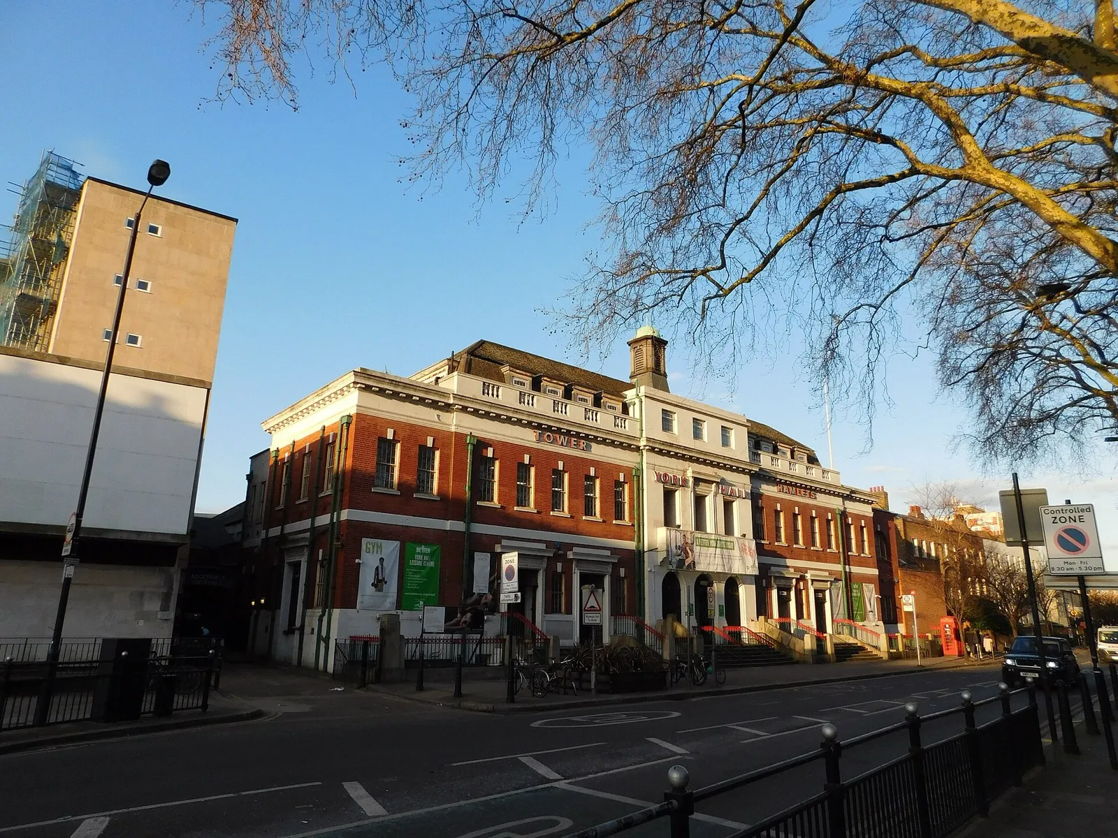 Red-brick facade of York Hall in Bethnal Green, on the corner of Old Ford Road